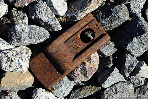 Rusted railroad steel discarded on metamorphic stone in Vermilion County Illinois still life Americana Collection